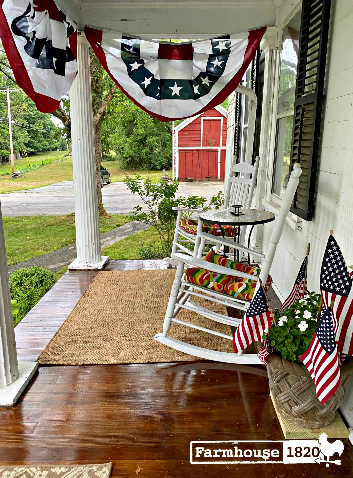 Tour this old farmhouse with charming front porch and big red barn 