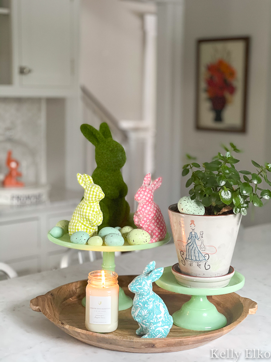 Spring home tour - love the colorful bunnies and eggs display kellyelko.com