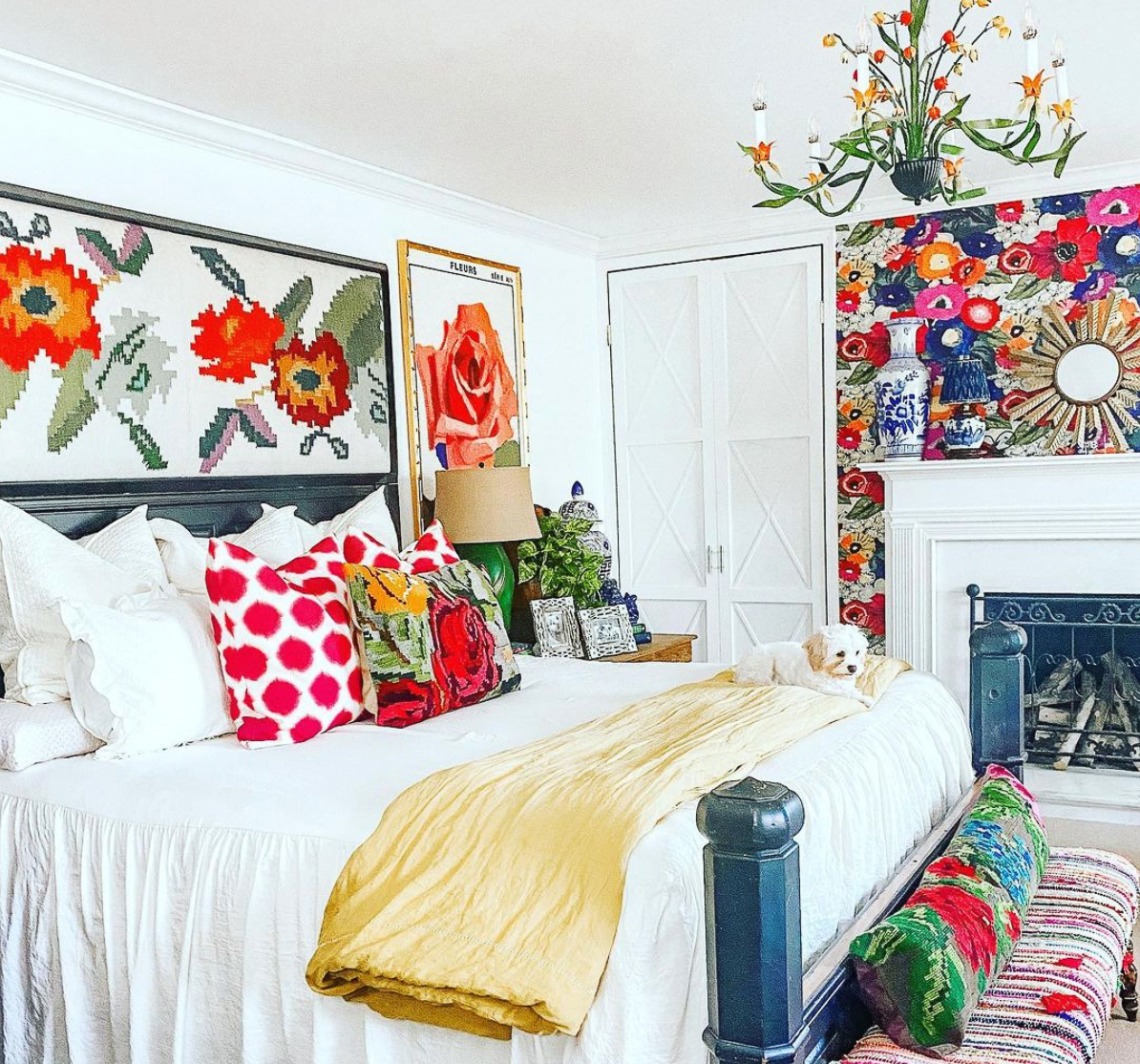 Love this cheerful and colorful master bedroom with floral wallpaper 