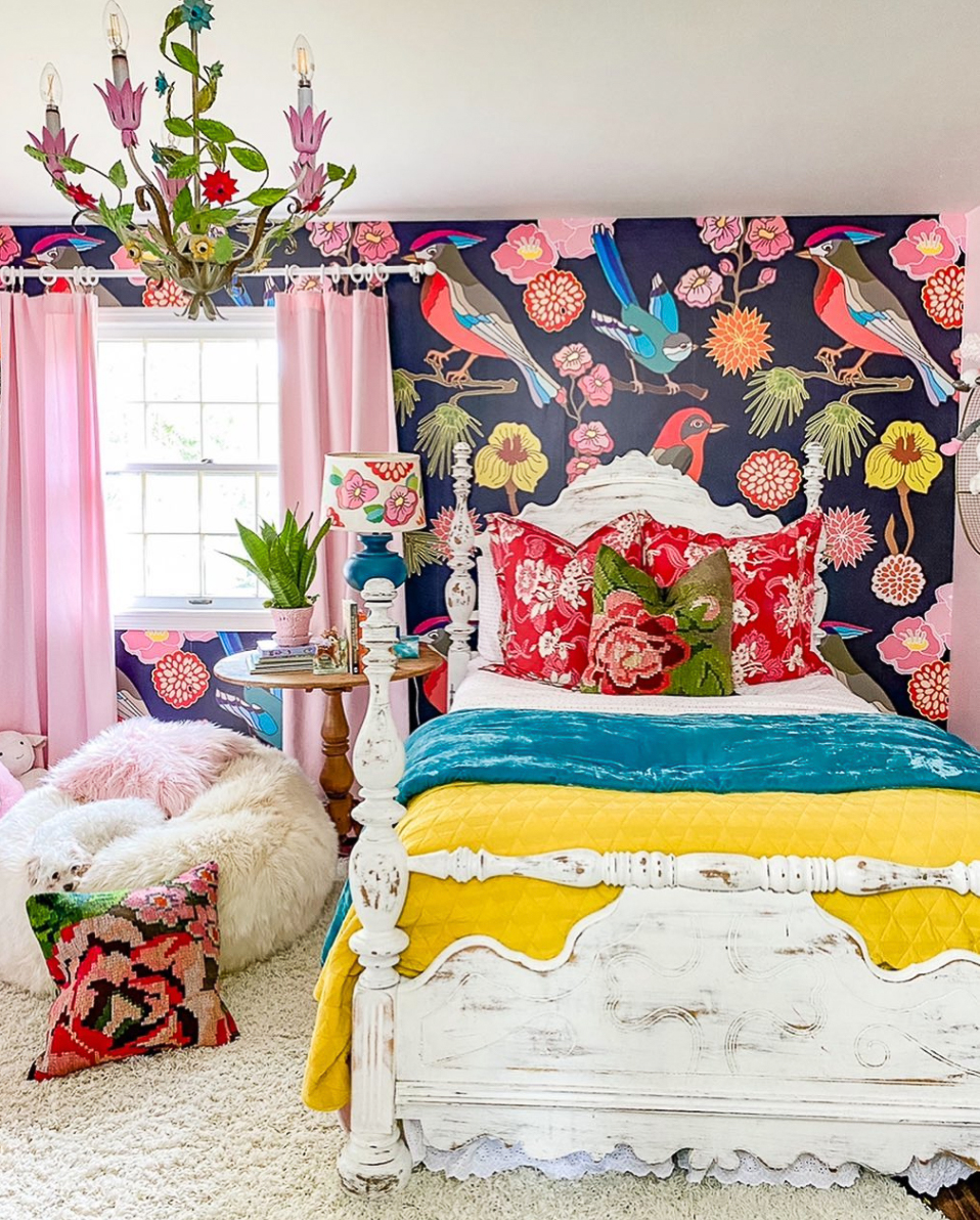 Love this colorful girls bedroom with bird mural 