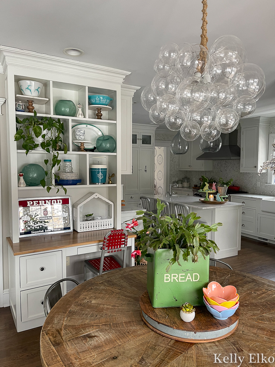 Gorgeous farmhouse kitchen with whimsical bubble chandelier kellyelko.com 