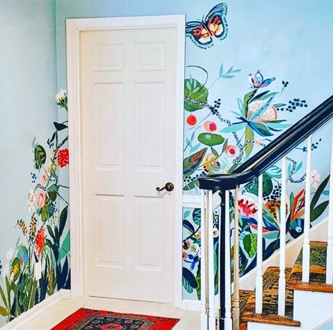 Hand painted mural on the staircase