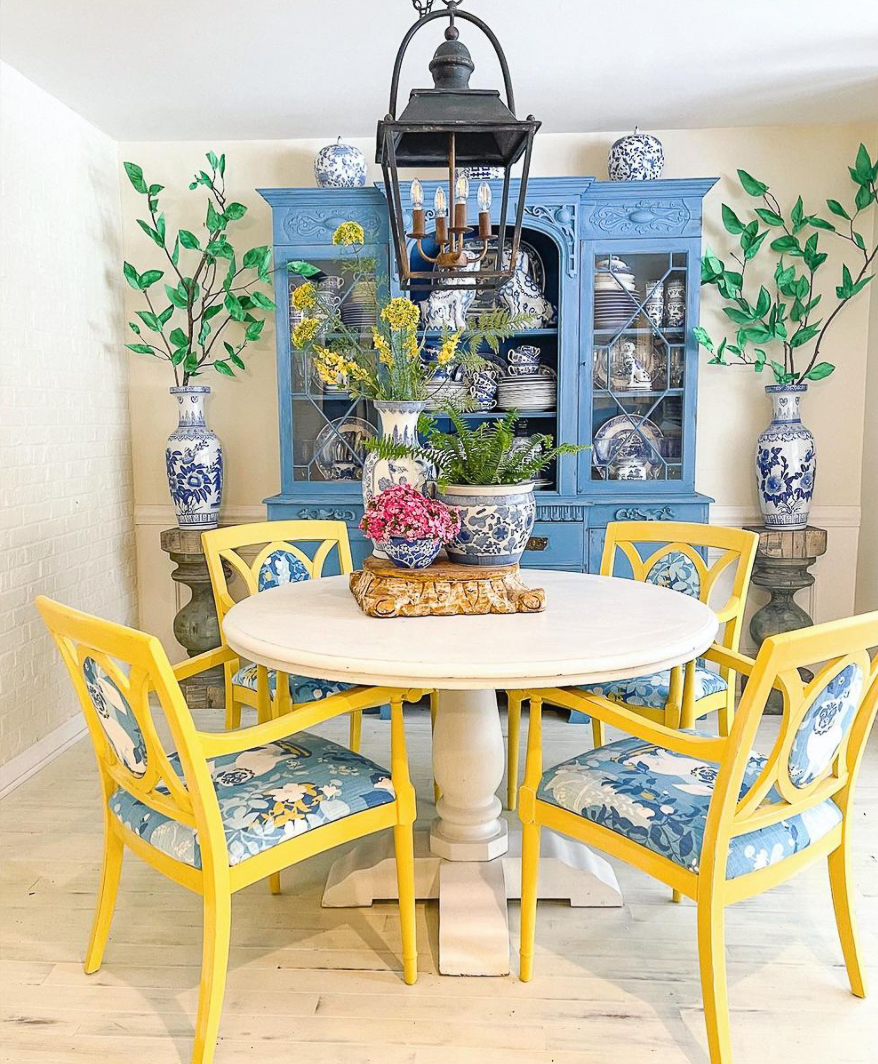 Vintage furniture takes on a new life painted bold colors in this dining room