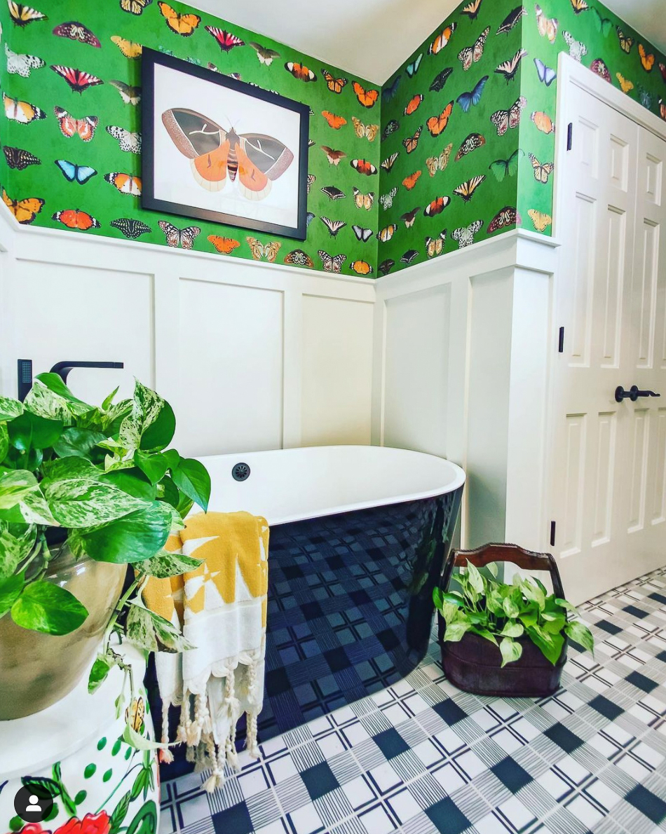 Amazing bathroom transformation with butterfly wallpaper and black and white tile