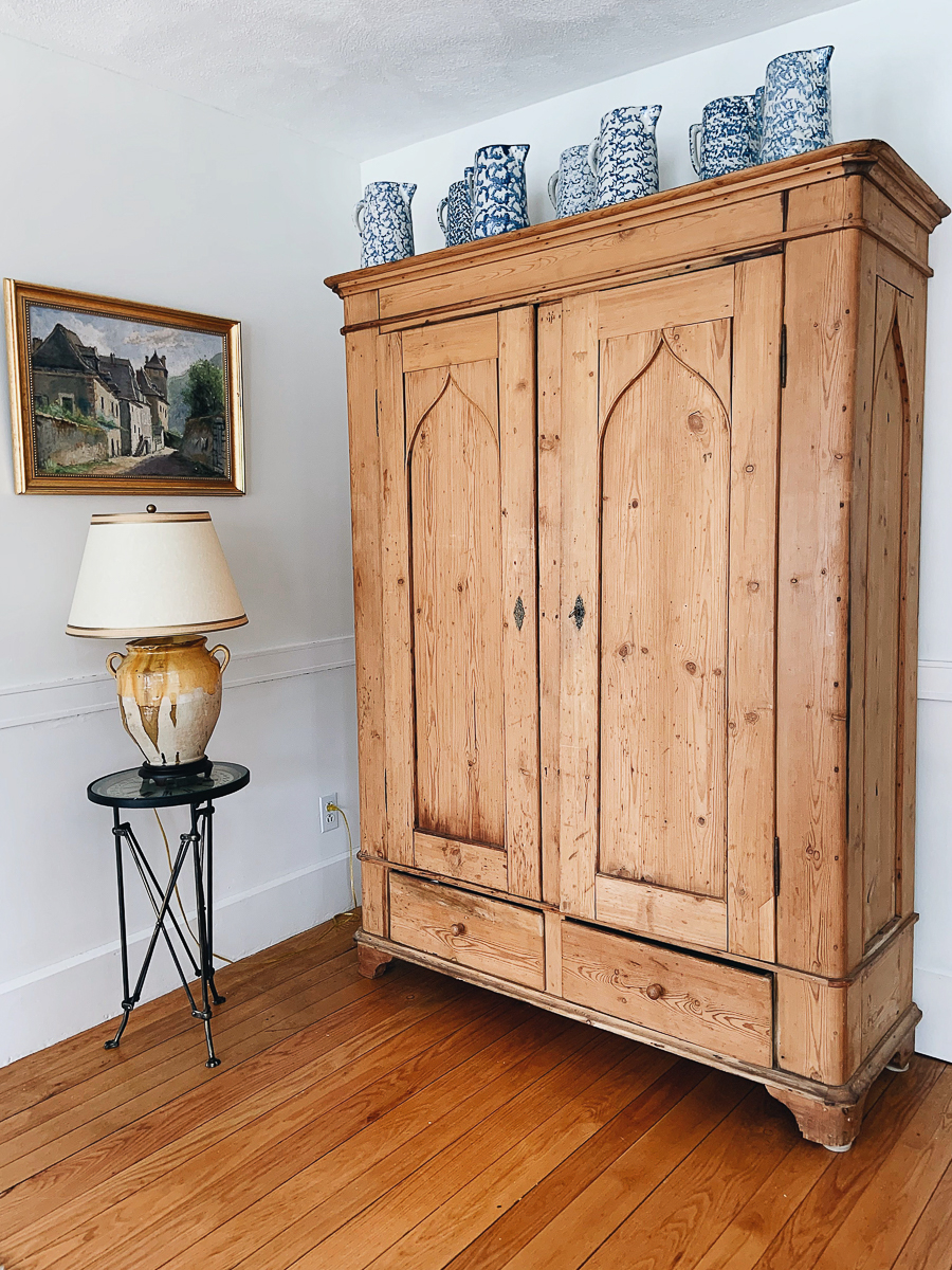 Gorgeous bleached pine armoire with a collection of blue sponge ware kellyelko.com