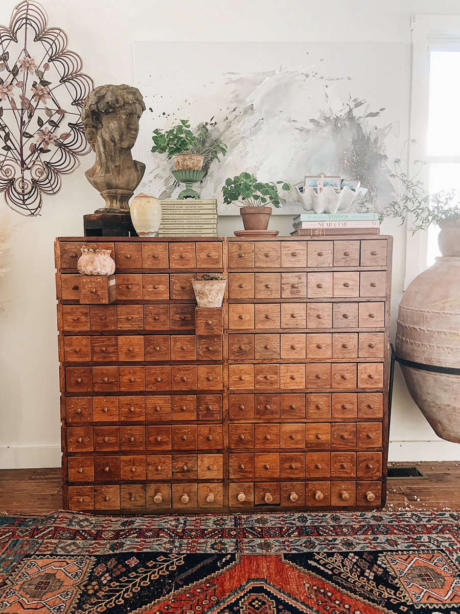 Stunning antique apothecary chest and French mourning wreath in this beautiful farmhouse kellyelko.com