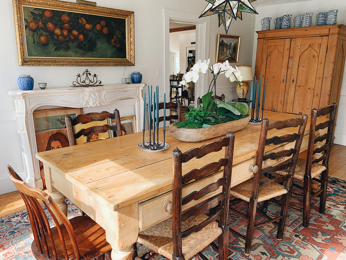 Rustic farmhouse dining room with antique table and chairs and original art kellyelko.com