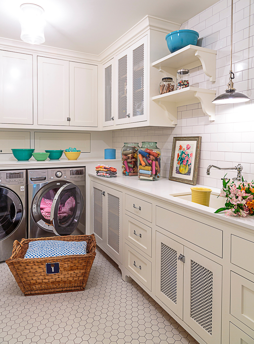 Beautiful white laundry room with sink and open shelves kellyelko.com