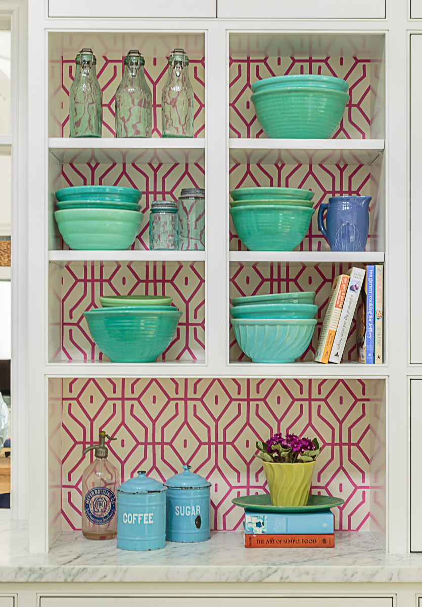 Love the wallpaper on the back wall of these open kitchen cabinets kellyelko.com