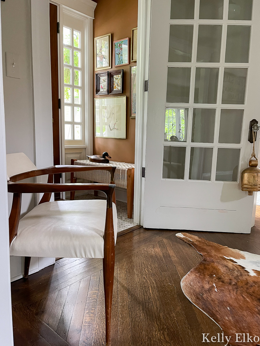 Love this old house entrance vestibule and the eclectic gallery wall kellyelko.com