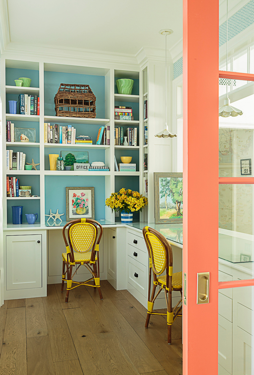 Love this home office with orange pocket door kellyelko.com