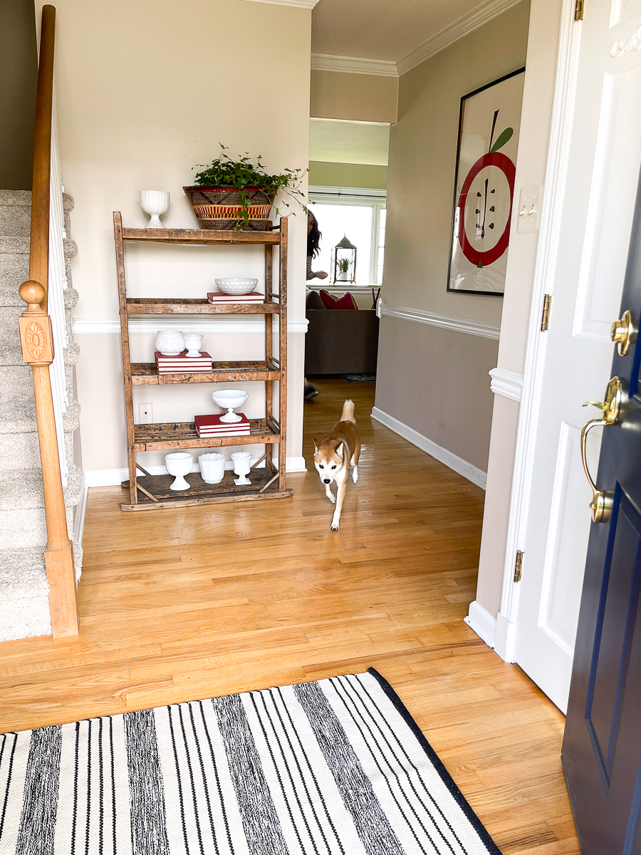 Home Staging After - love this beautiful entry with antique wood rack kellyelko.com