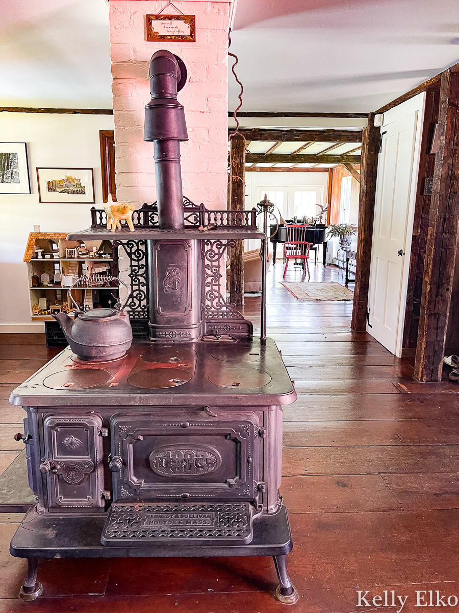 Love the original wood burning stove in the historic William Marston house on Cape Cod that is available to rent kellyelko.com