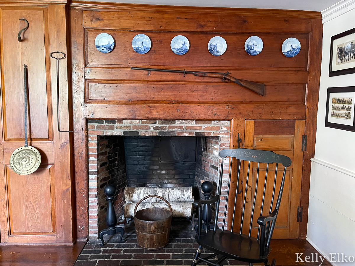 Original wood burning fireplace in this historic kitchen kellyelko.com