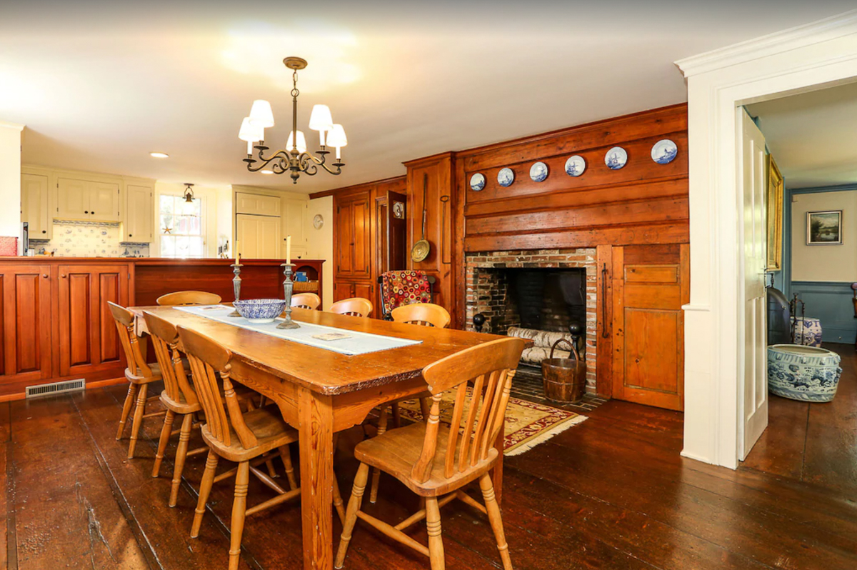 Love this original wood and huge fireplace in this historic home kitchen kellyelko.com