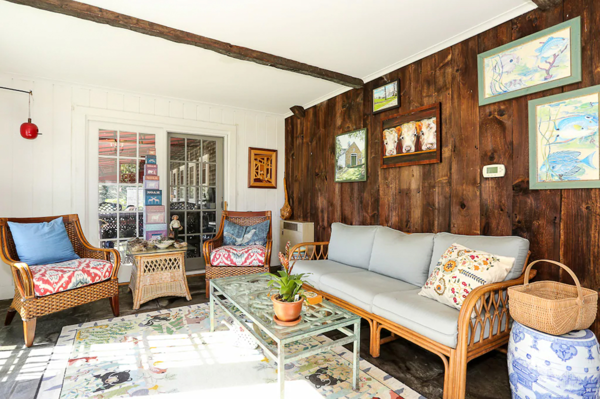 Beautiful sunroom with exposed wood wall and beams kellyelko.com