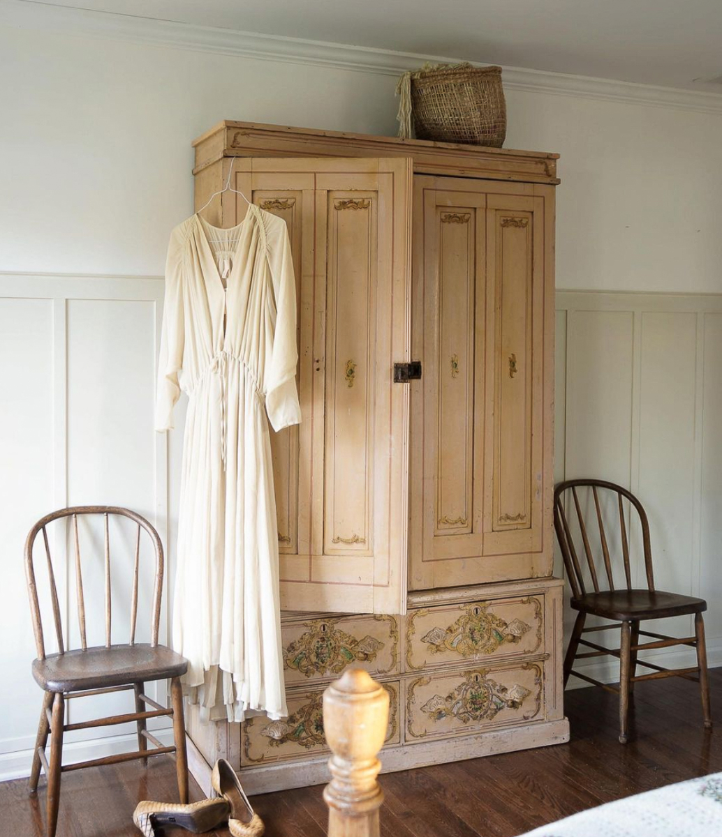 Antique pine armoire stripped and sanded in this farmhouse bedroom kellyelko.com