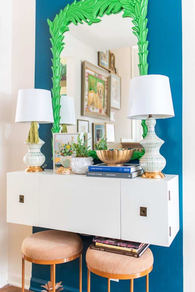 Add a pop of color to a white wall by painting a stripe of blue or other boldly colored paint kellyelko.com