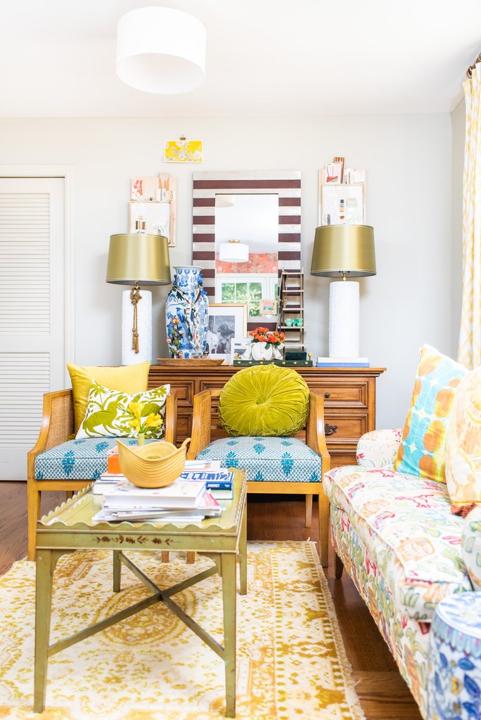 Colorful and eclectic family room with vintage furniture and colorful upholstery kellyelko.com