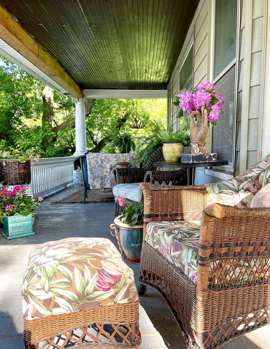 Old farmhouse porch - love all the wicker furniture and the dark painted roof and floor kellyelko.com