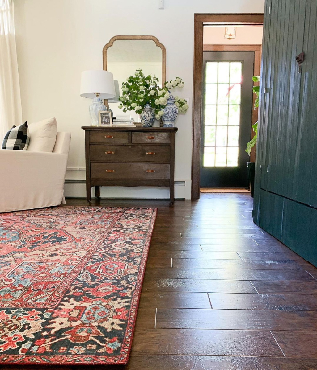 Beautiful farmhouse tour - love the antique furniture and huge green cabinet.