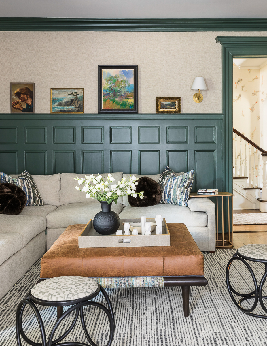 Dramatic, dark and rich green paint in this cozy family room kellyelko.com