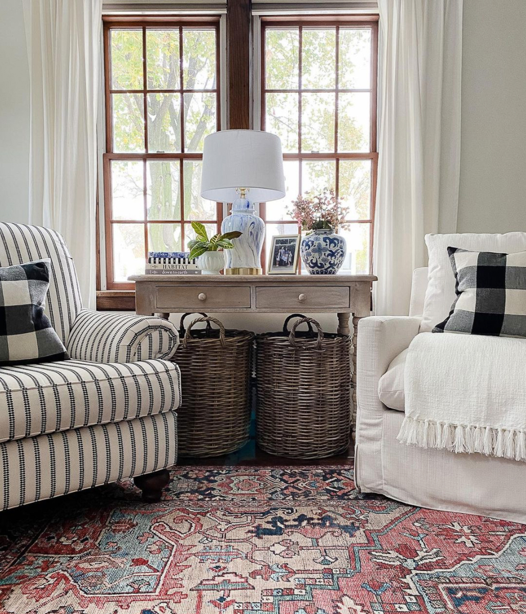 Create a cozy seating area with a pair of mismatched club chairs kellyelko.com