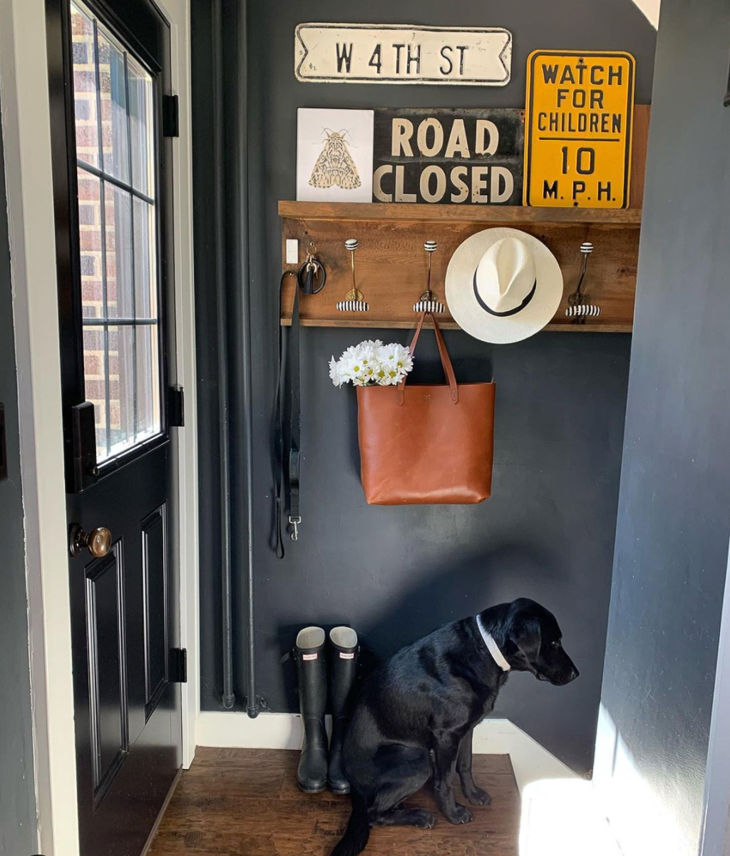 Love the black walls and door in this entry kellyelko.com