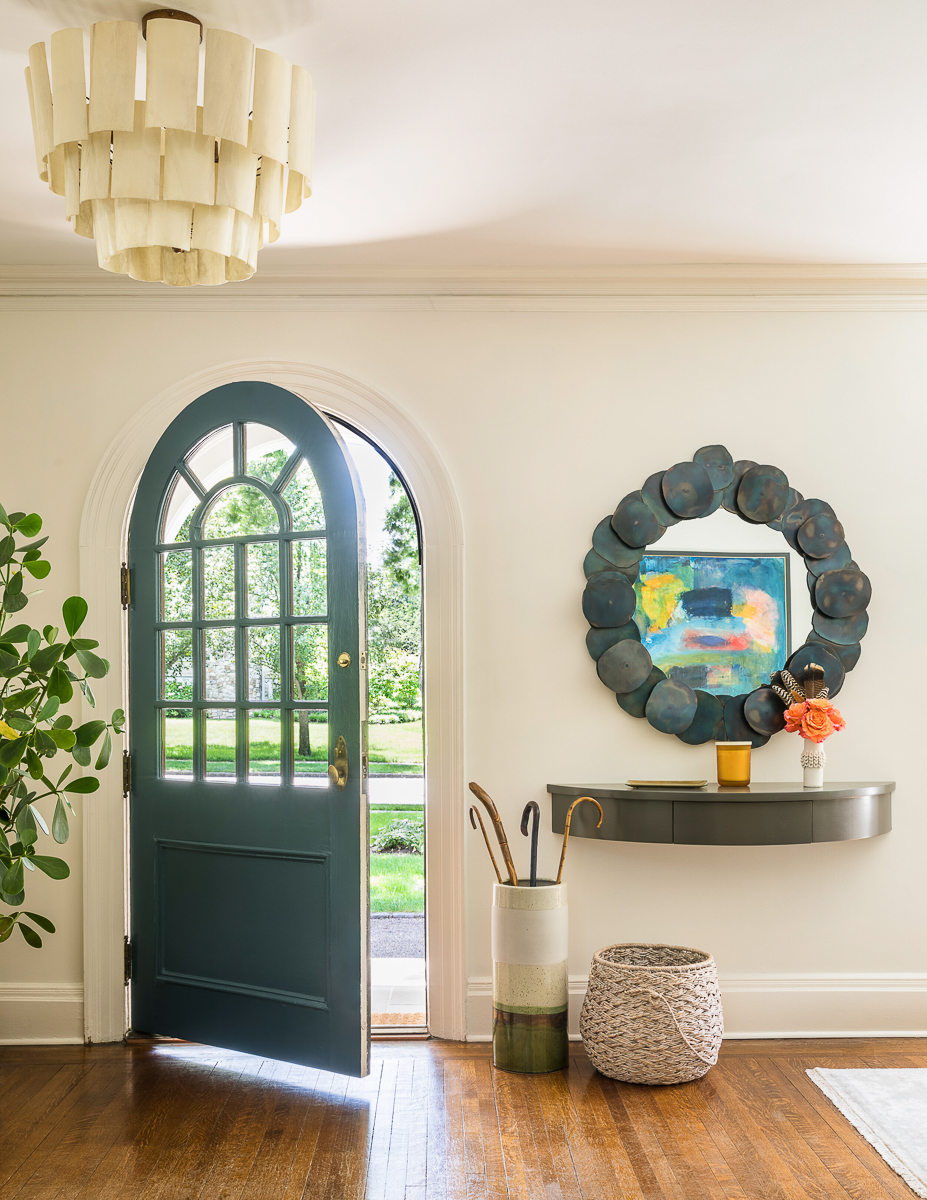 Love the arched door in this 100 year old colorful colonial revival home - don't miss the stunning tour kellyelko.com