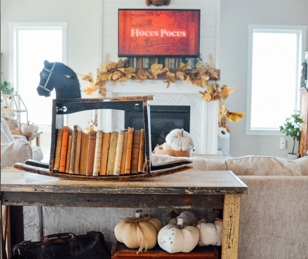 How cute is this vintage rocking horse turned book shelf! kellyelko.com 