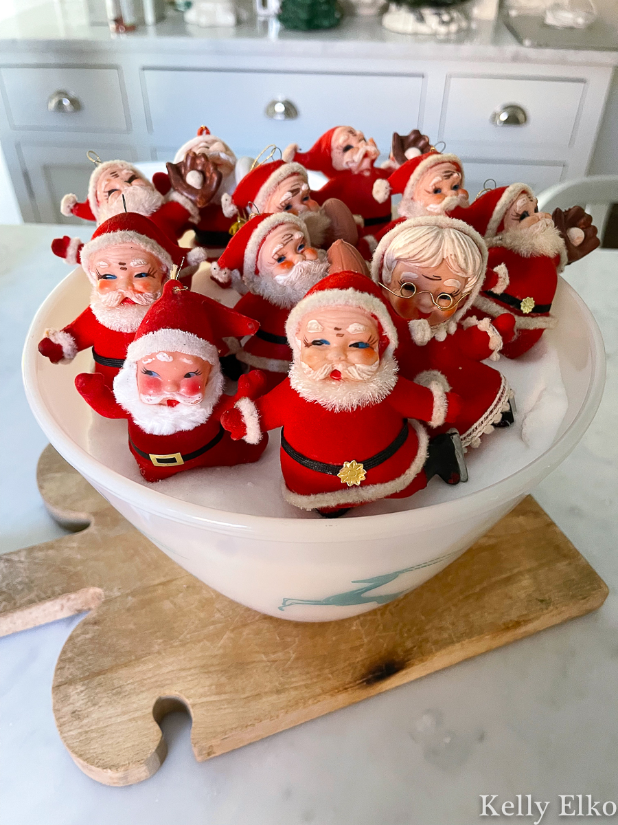 Love this bowl filled with vintage velvet Santa ornaments! kellyelko.com