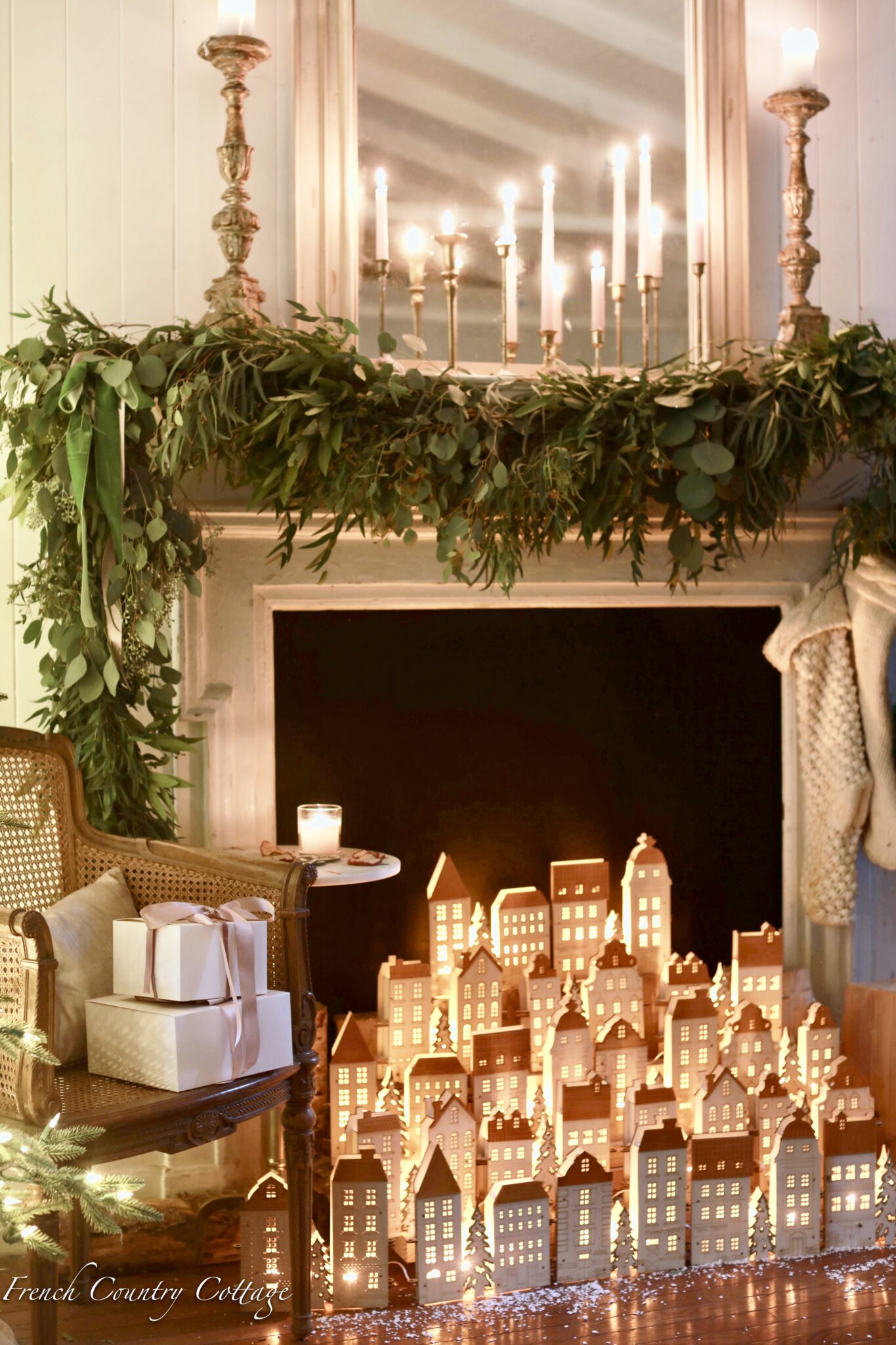 Love the glowing Christmas houses in this fireplace 