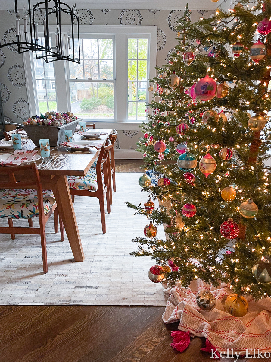 Christmas dining room decked out with two Christmas trees filled with tons of vintage Shiny Brites kellyelko.com