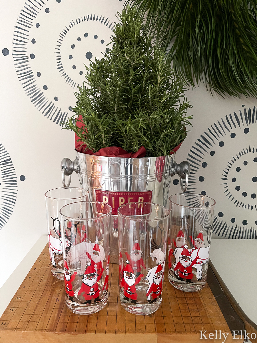 Love these vintage Santa and reindeer drinking glasses and Piper champagne bucket kellyelko.com