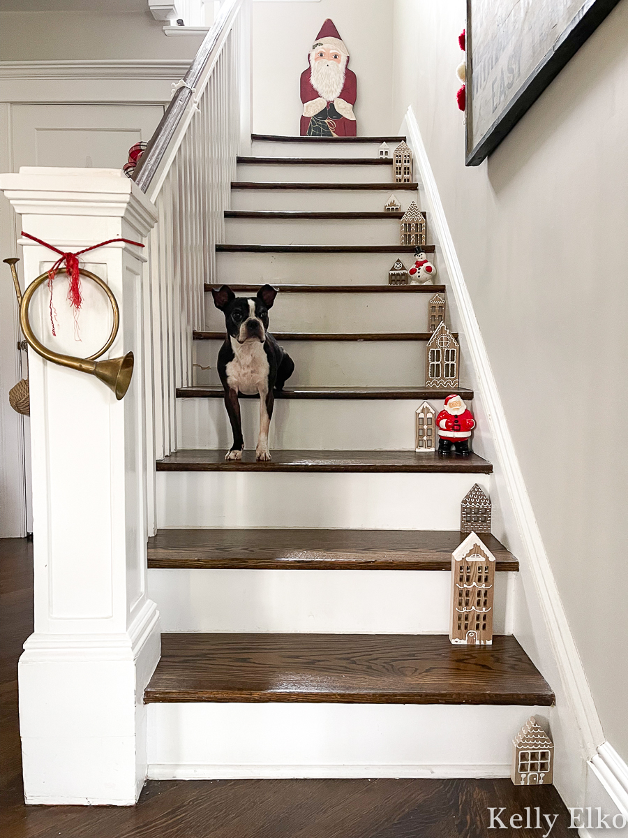 Christmas staircase - love the DIY wood gingerbread houses and the vintage wood Santas kellyelko.com