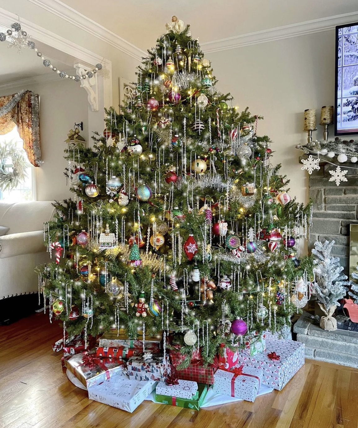 Tinsel inspired Christmas Tree - love that she used garland to mimic the look of tinsel!