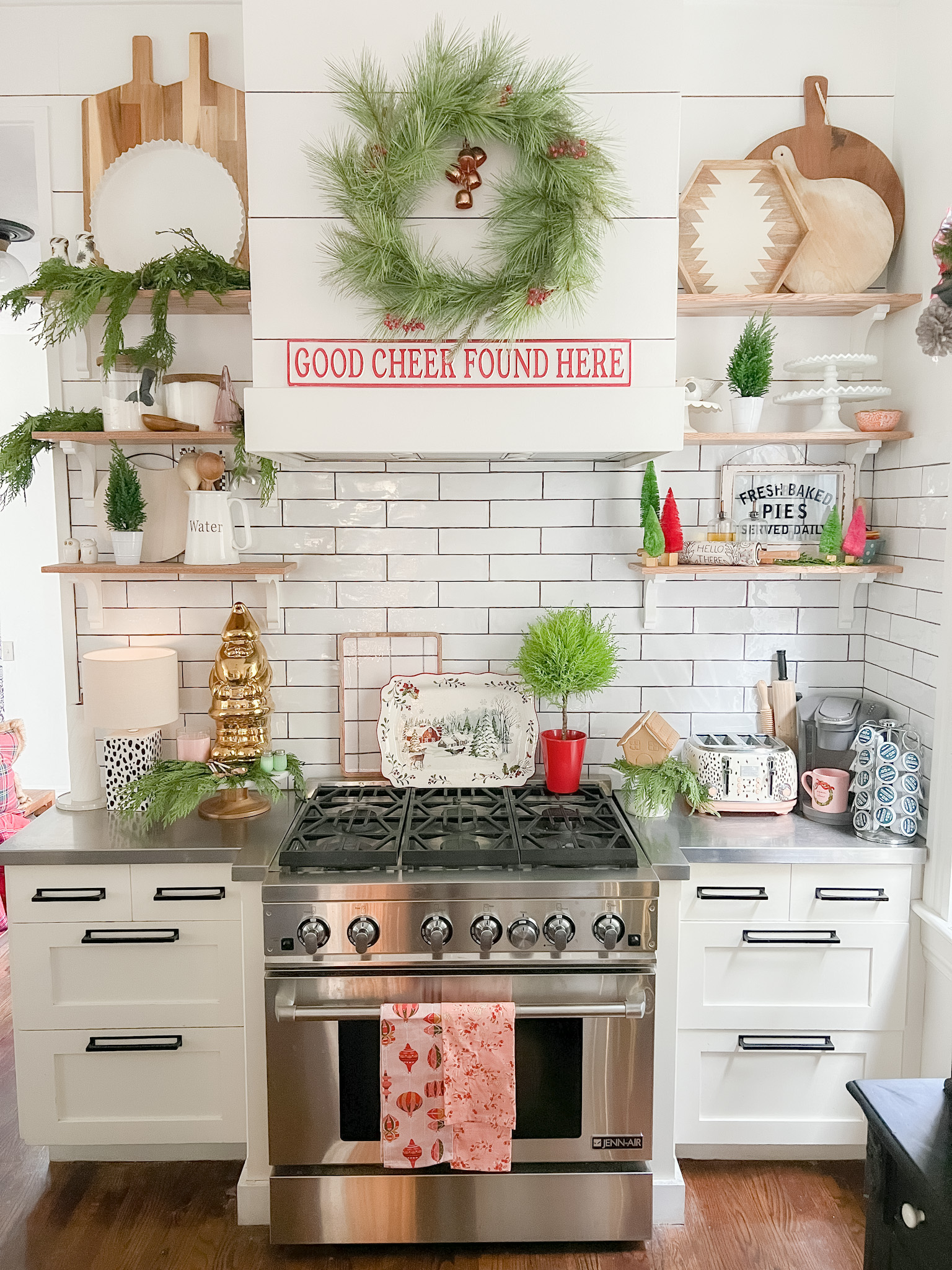 Farmhouse Christmas kitchen - love the cutting board collection 