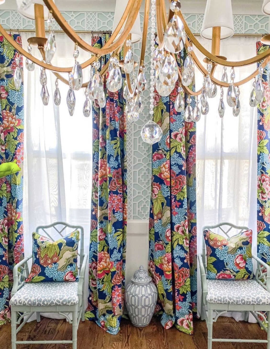 Love these colorful patterned drapes against traditional blue wallpaper kellyelko.com