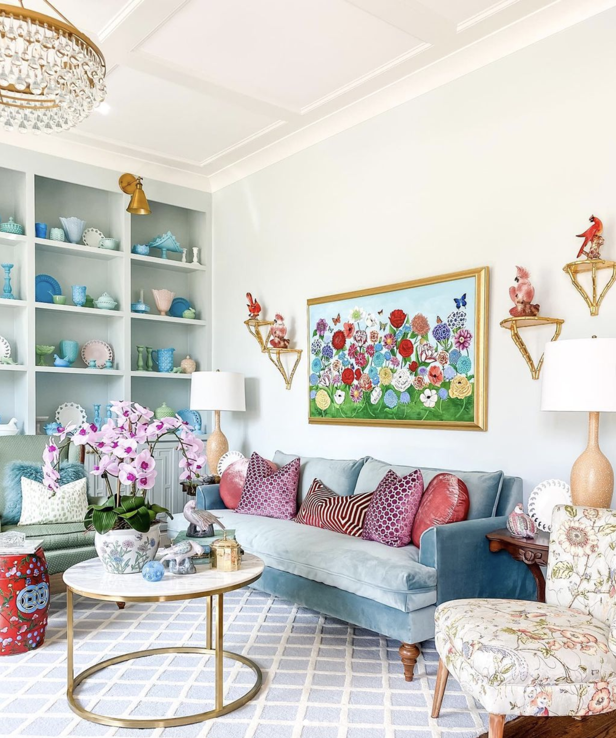 Colorful and traditional home tour - love the milk glass collection and the floral art kellyelko.com