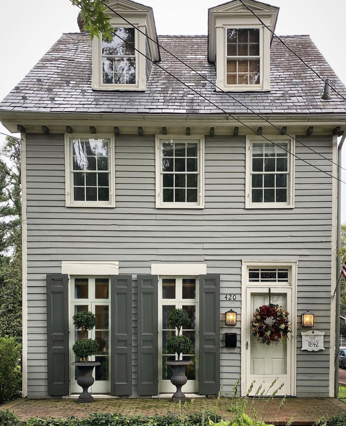 Historic 1800's home with dormers and shutters kellyelko.com