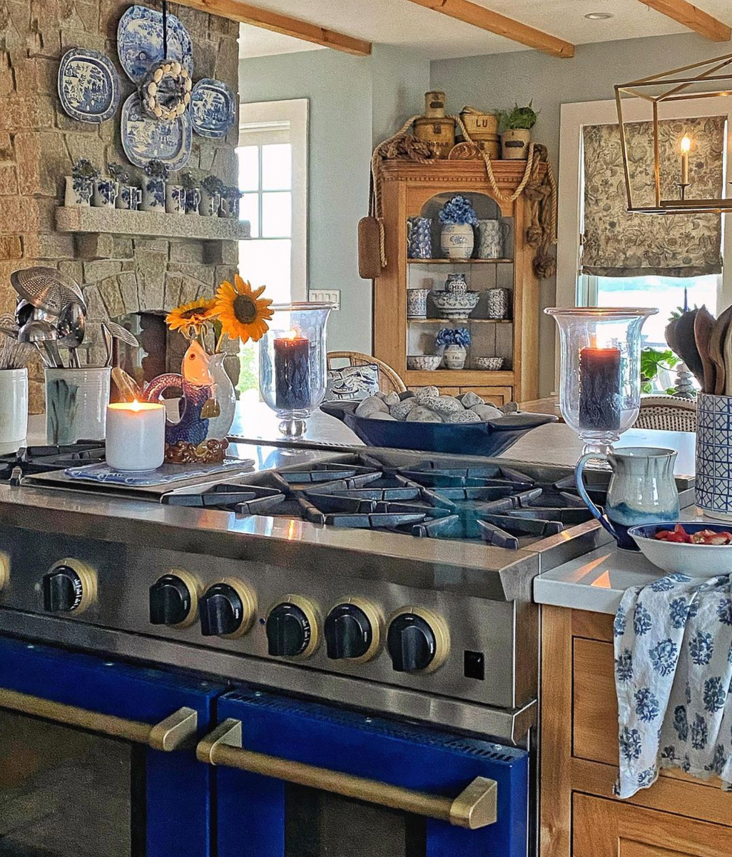 Beautiful blue stove in this classic coastal kitchen kellyelko.com