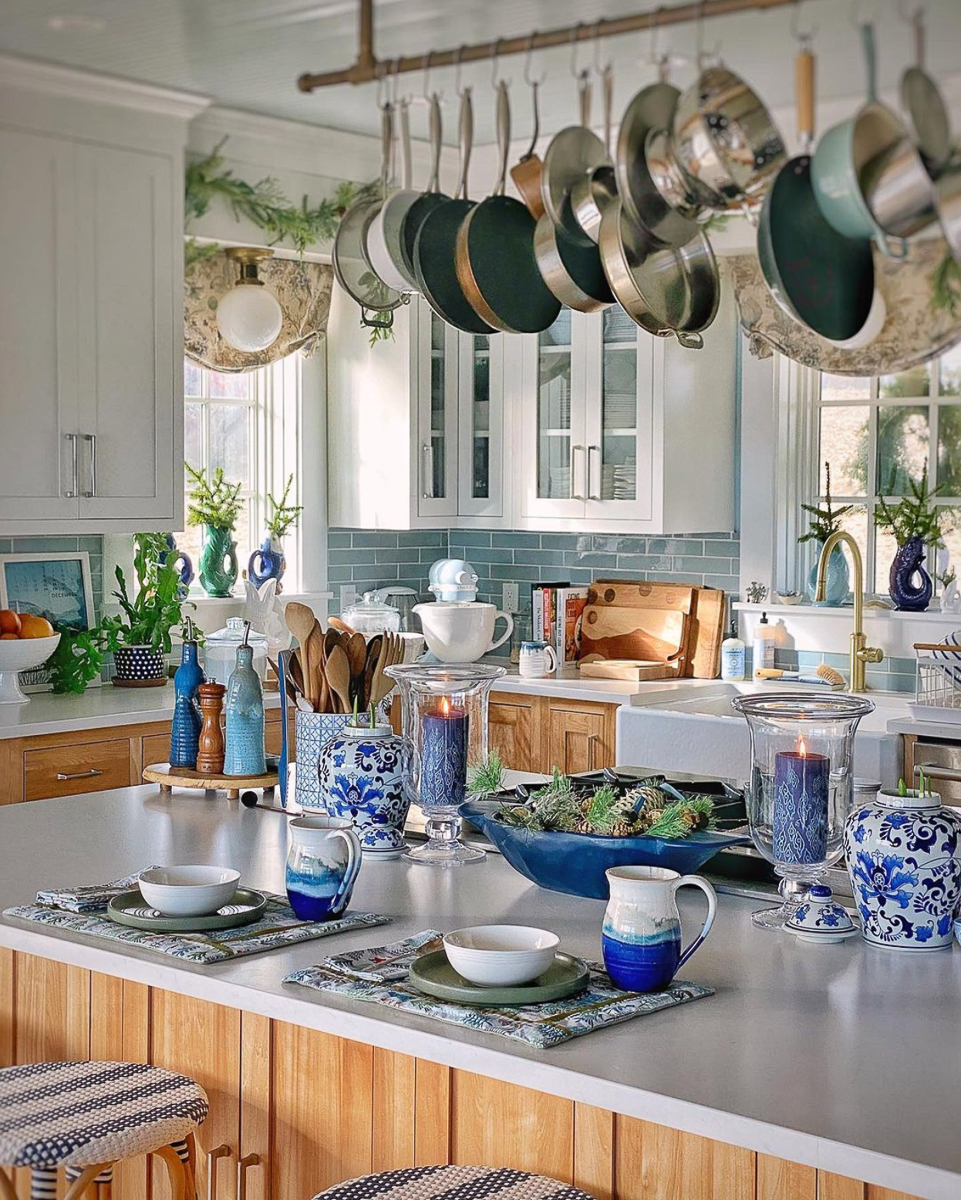 Farmhouse kitchen with industrial pot rack kellyelko.com