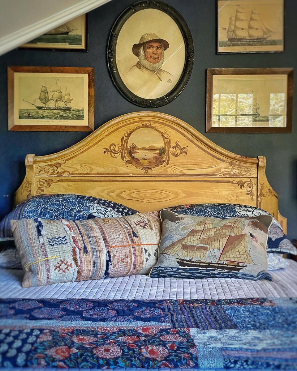 Coastal bedroom with ship gallery wall kellyelko.com