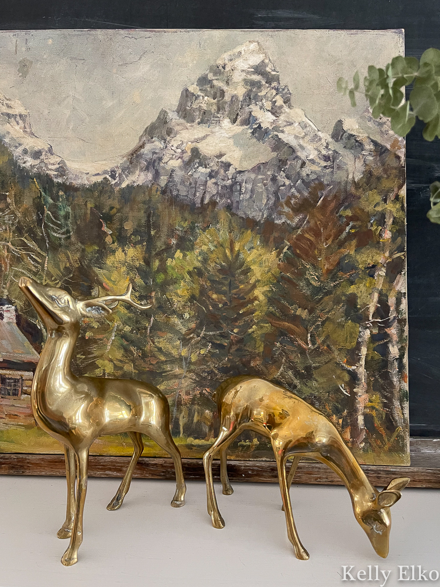 Love this vintage winter landscape painting and brass deer kellyelko.com