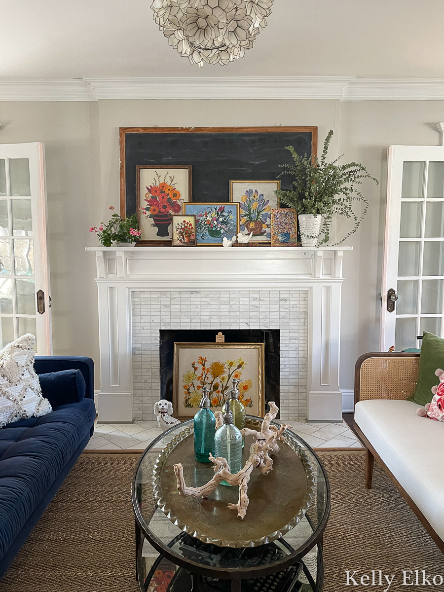 Love this mantel with vintage floral art