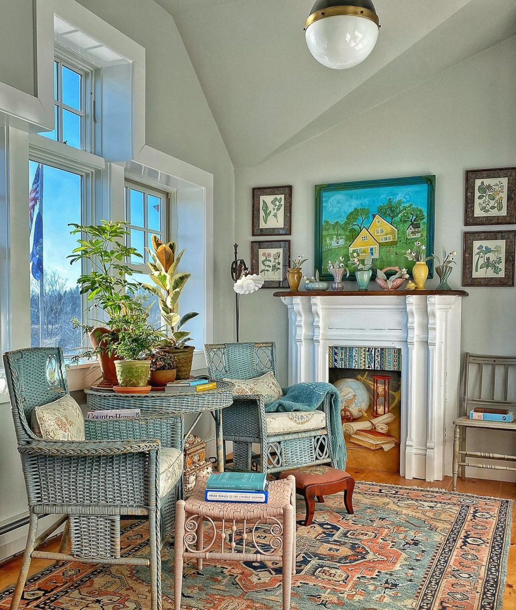 Coastal bedroom with painted wicker furniture and whimsical art kellyelko.com