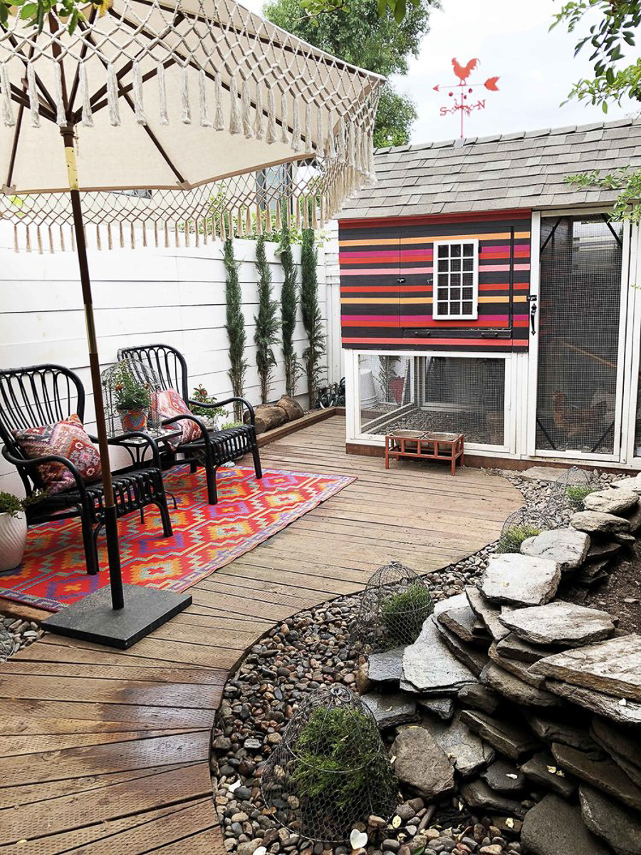 Cute chicken coop in bright colorful stripes 