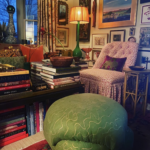 Cluttercore - love this cozy corner filled with art, books and prized possessions