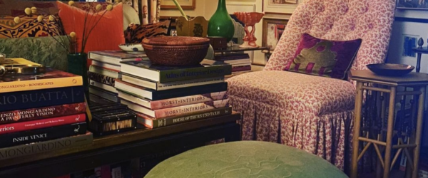 Cluttercore - love this cozy corner filled with art, books and prized possessions