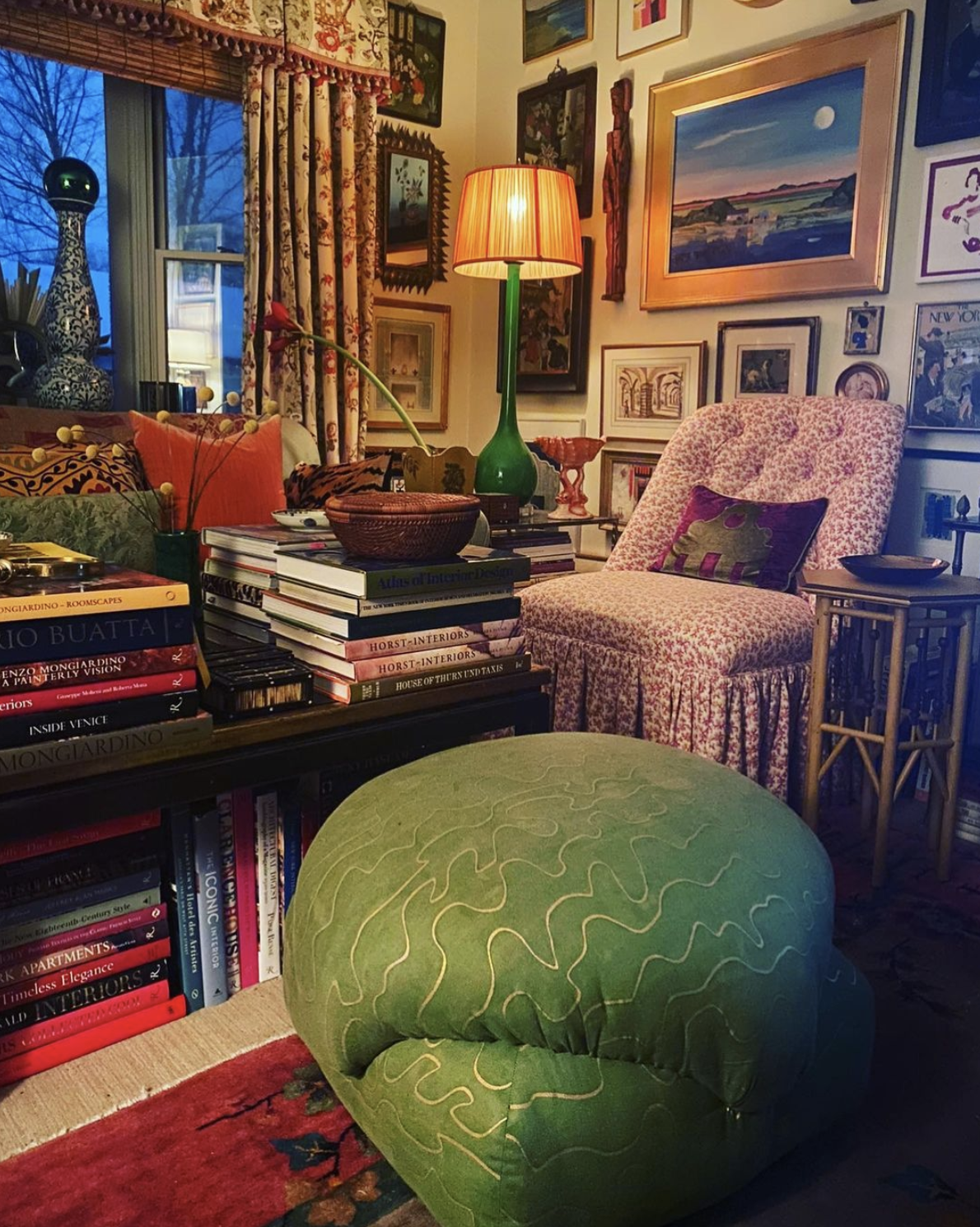 Cluttercore - love this cozy corner filled with art, books and prized possessions 